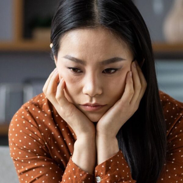 woman feeling bad on the couch