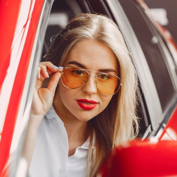 woman in a sports car