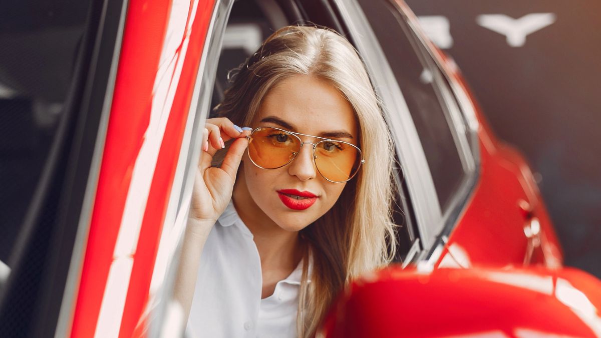 woman in a sports car