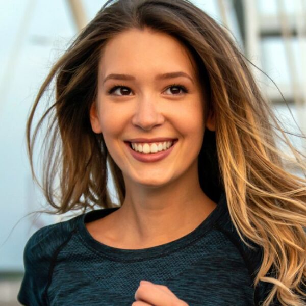 woman jogging on the bridge