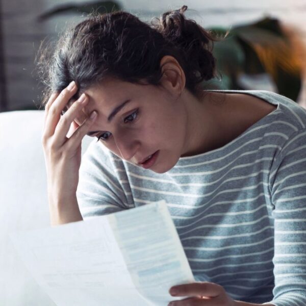 woman looking at her billing statement
