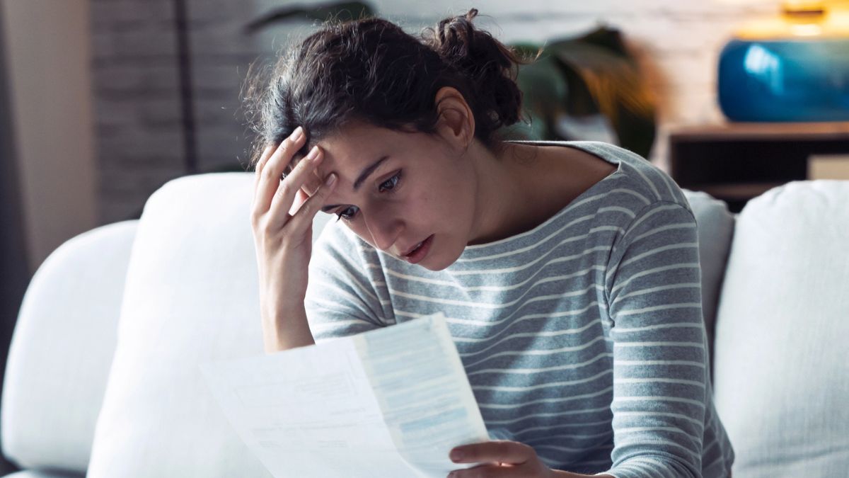 woman looking at her billing statement