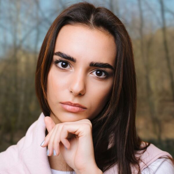 woman outside stunned