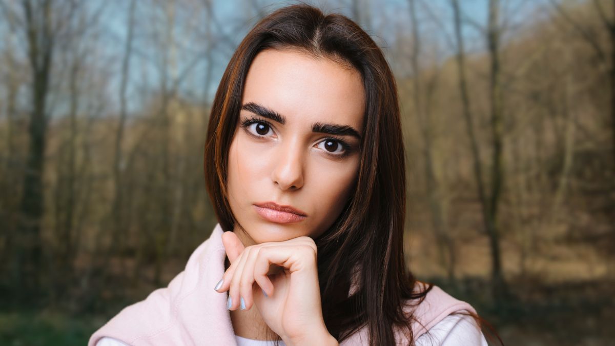 woman outside stunned