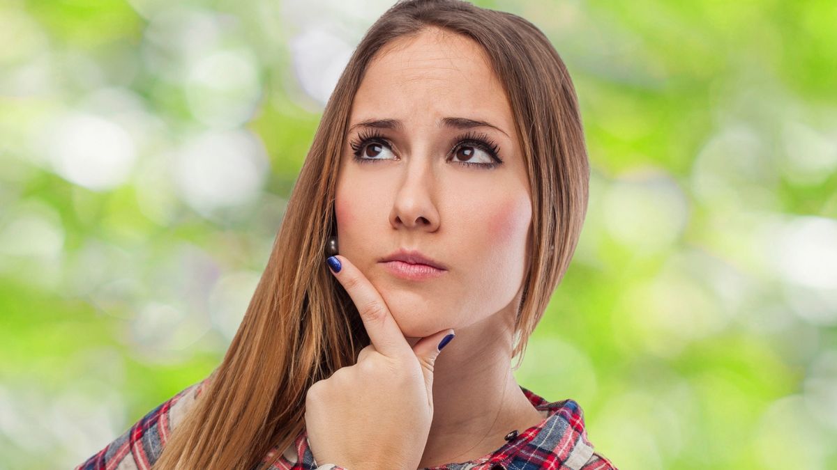 woman outside thinking to herserlf