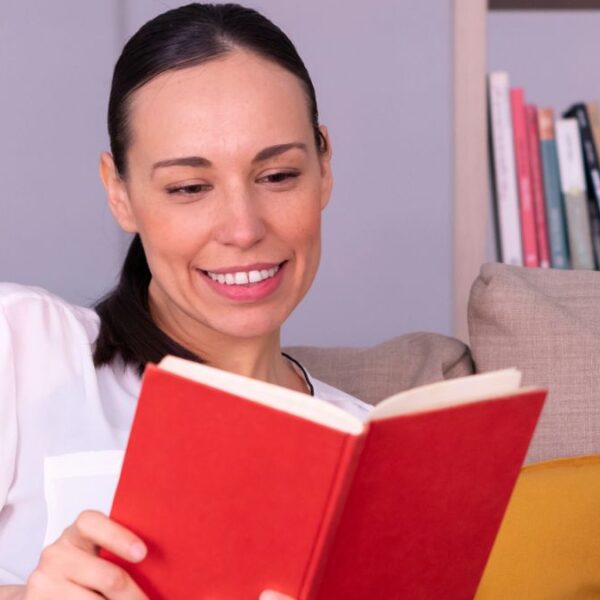 woman reading a red book