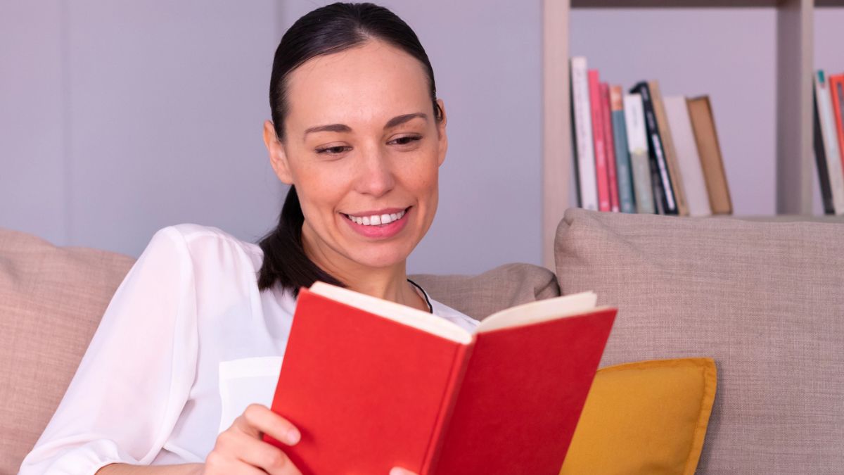 woman reading a red book