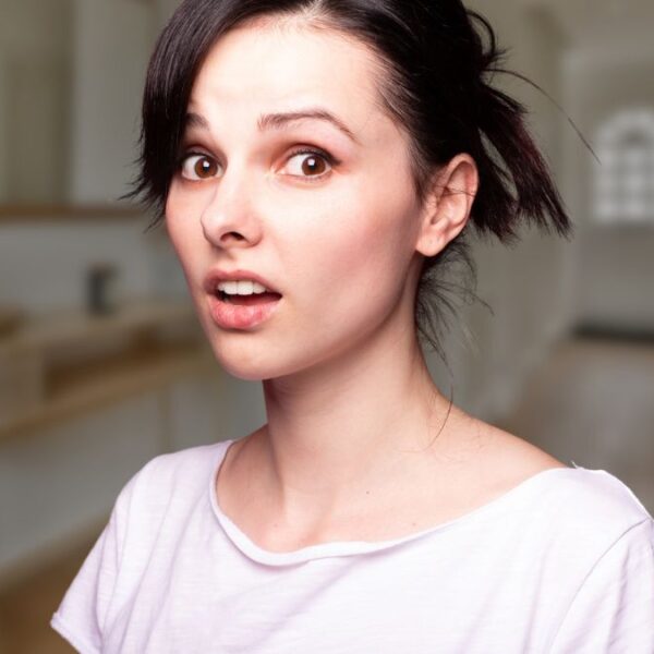 woman shocked at home (1)