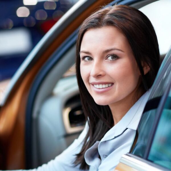 woman sitting in the car
