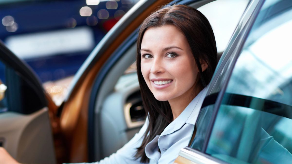 woman sitting in the car