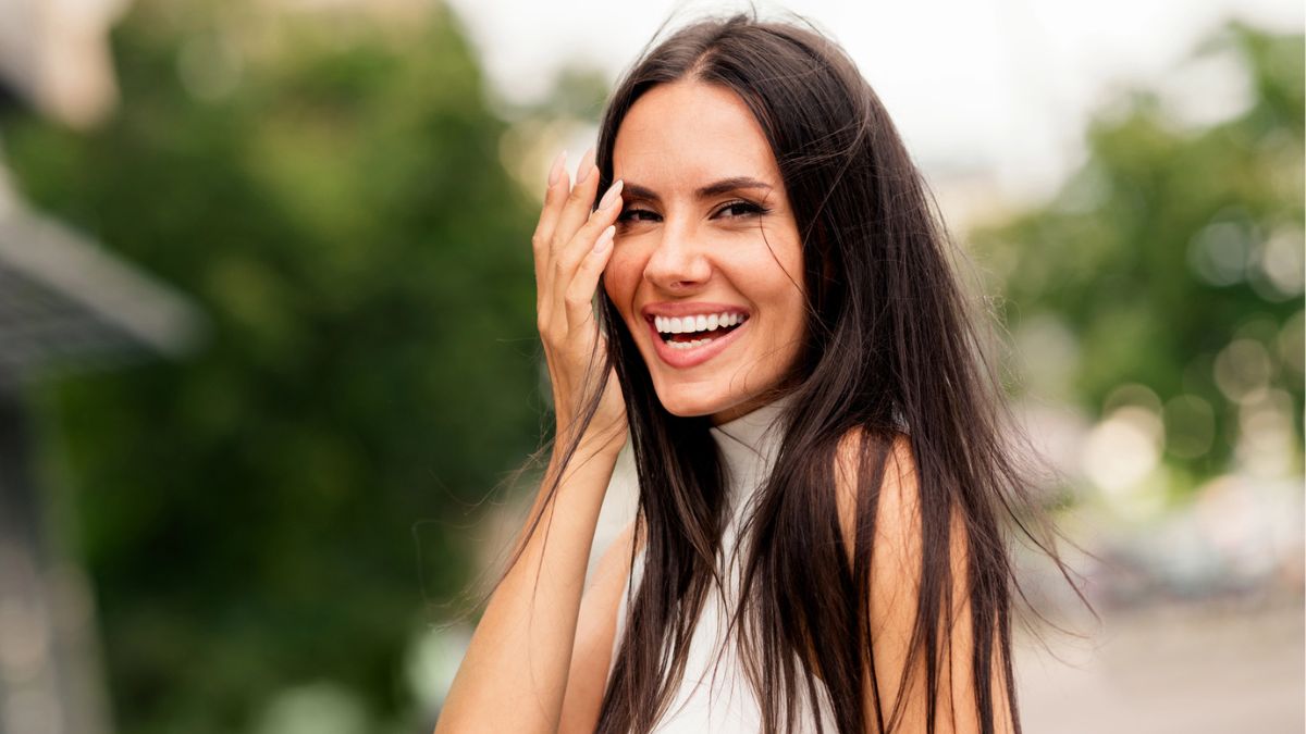 woman smiling happy white shirt