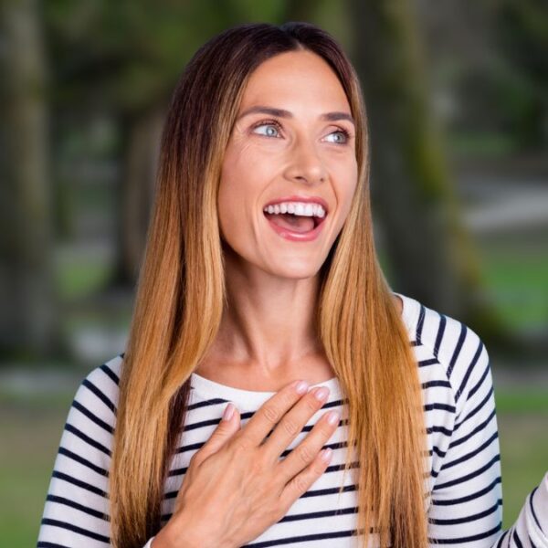 woman standing outside in the park