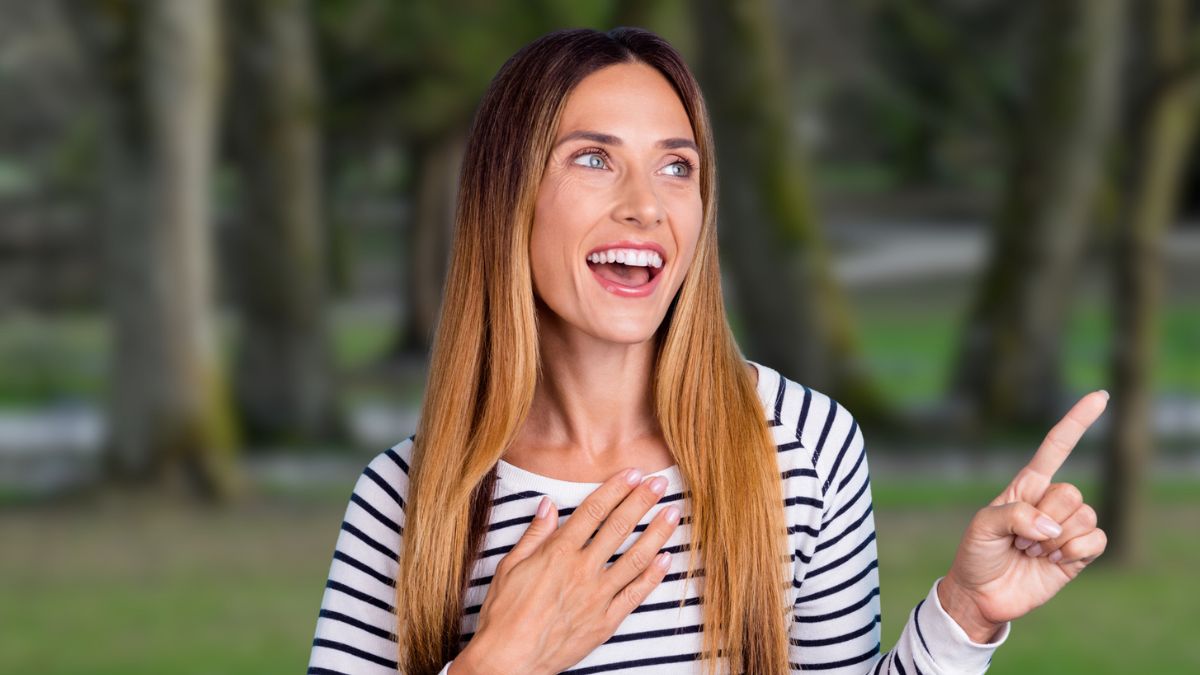 woman standing outside in the park