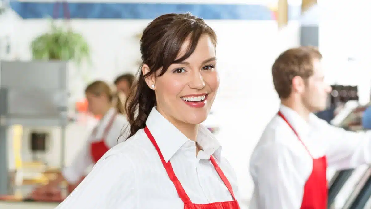 woman wearing a red apron
