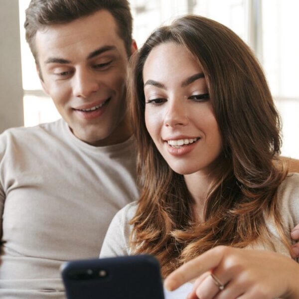 couple looking at their phone