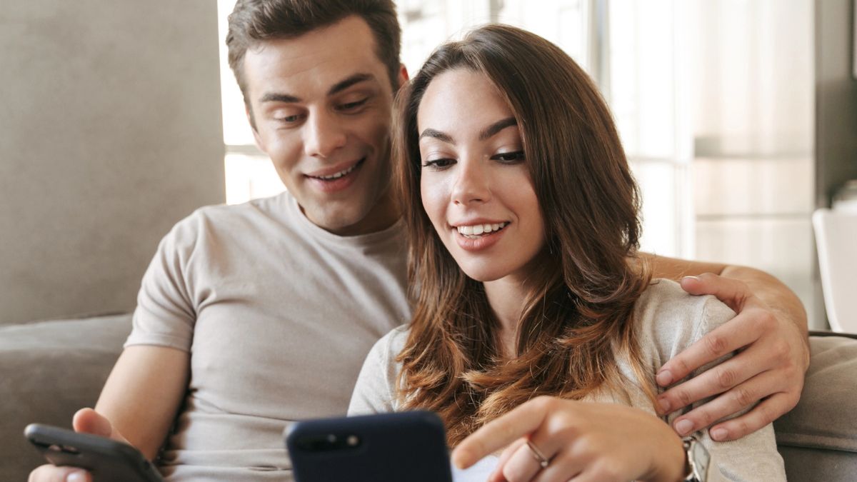 couple looking at their phone