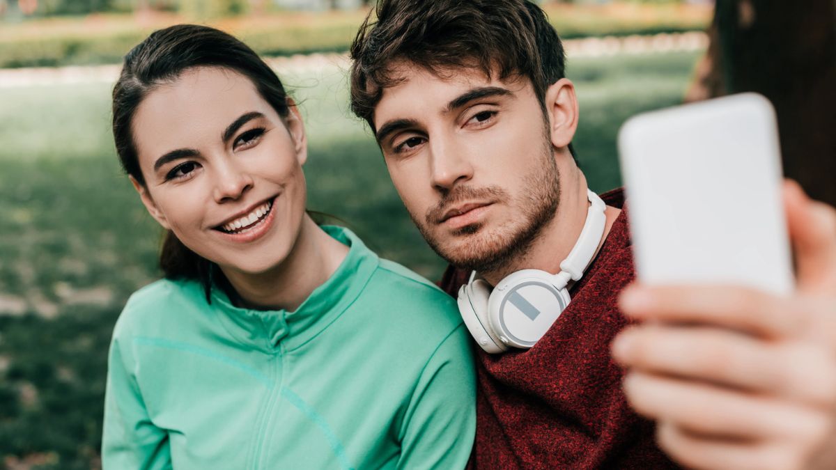 couple taking a selfie in the park