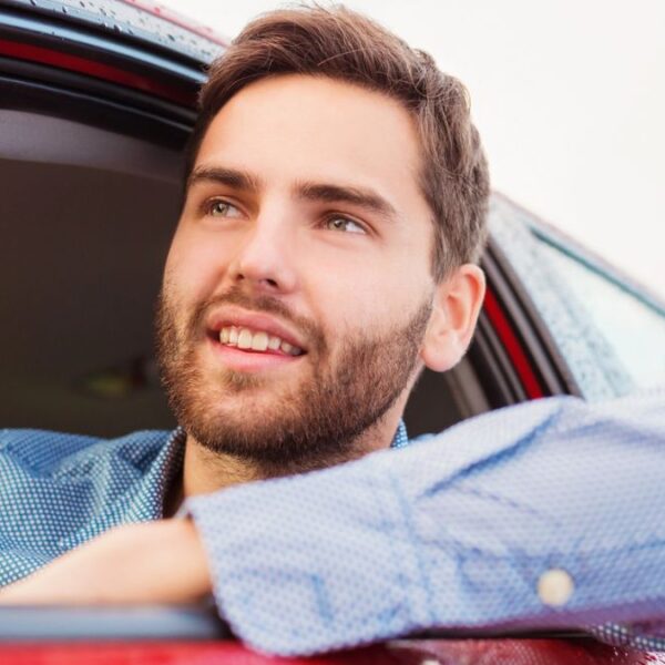 man hand outside of a car
