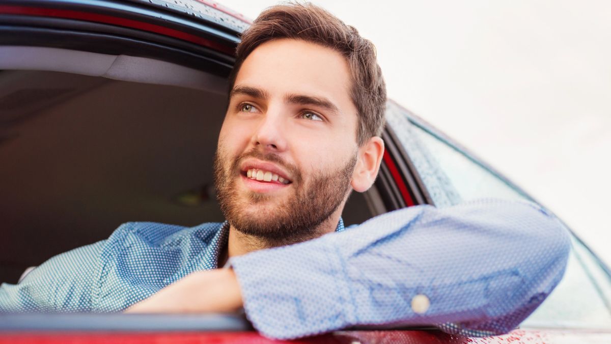 man hand outside of a car