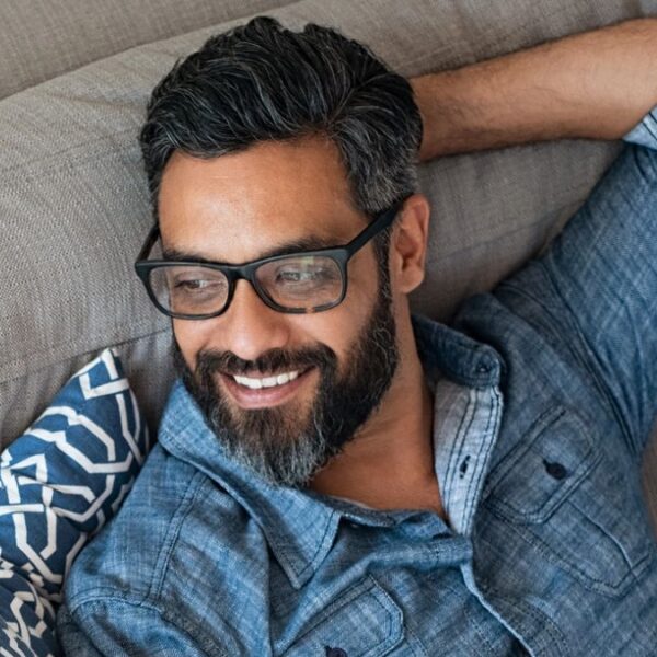 man relaxing on the couch