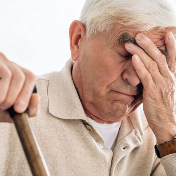 man with a cane tired