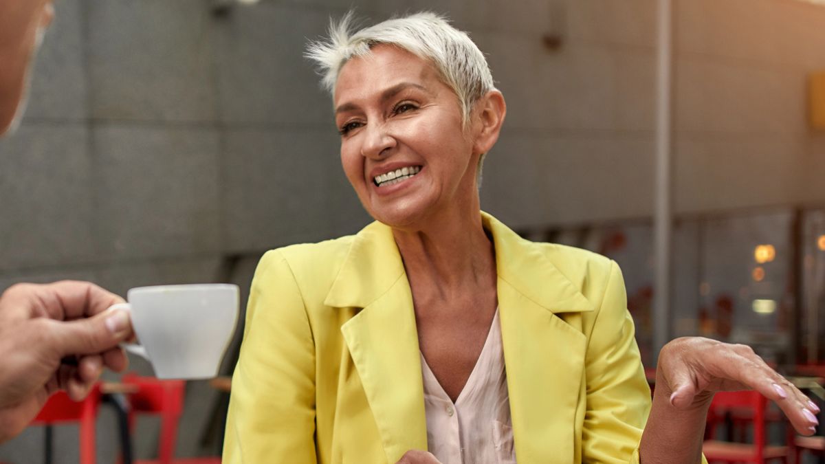 mature woman having coffee