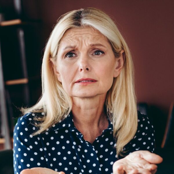 mature woman struggling in office