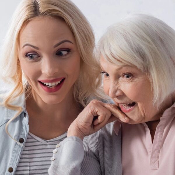 mother daughter laughing laptop