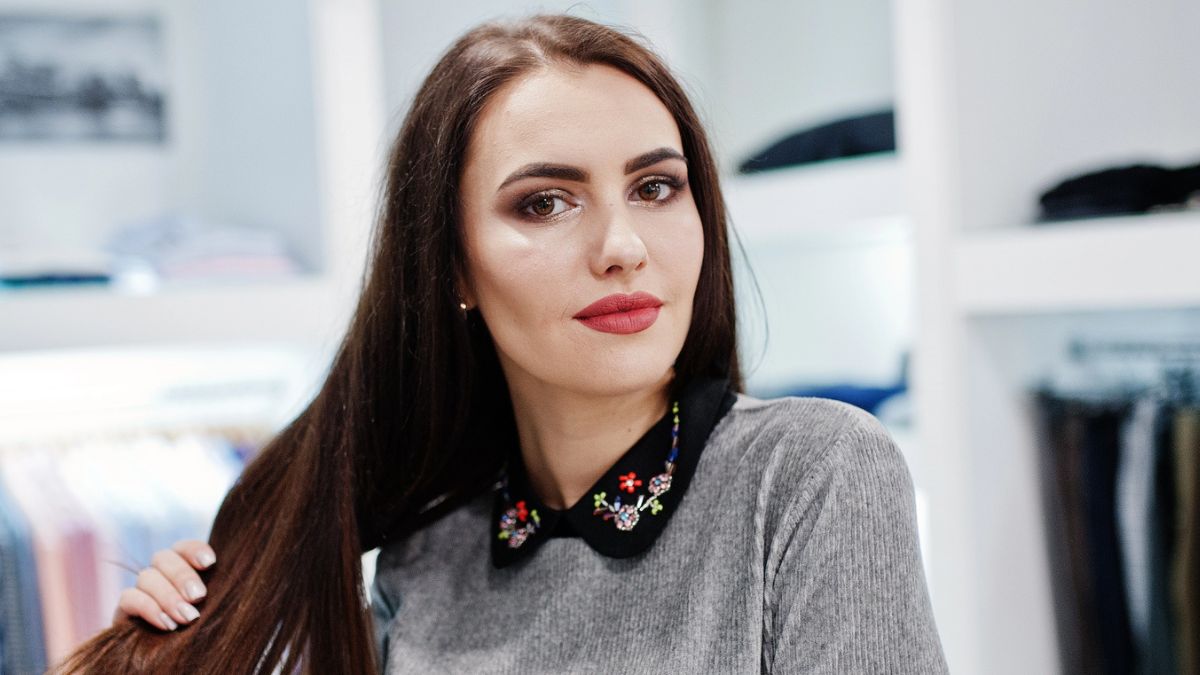 woman brunette shopping store