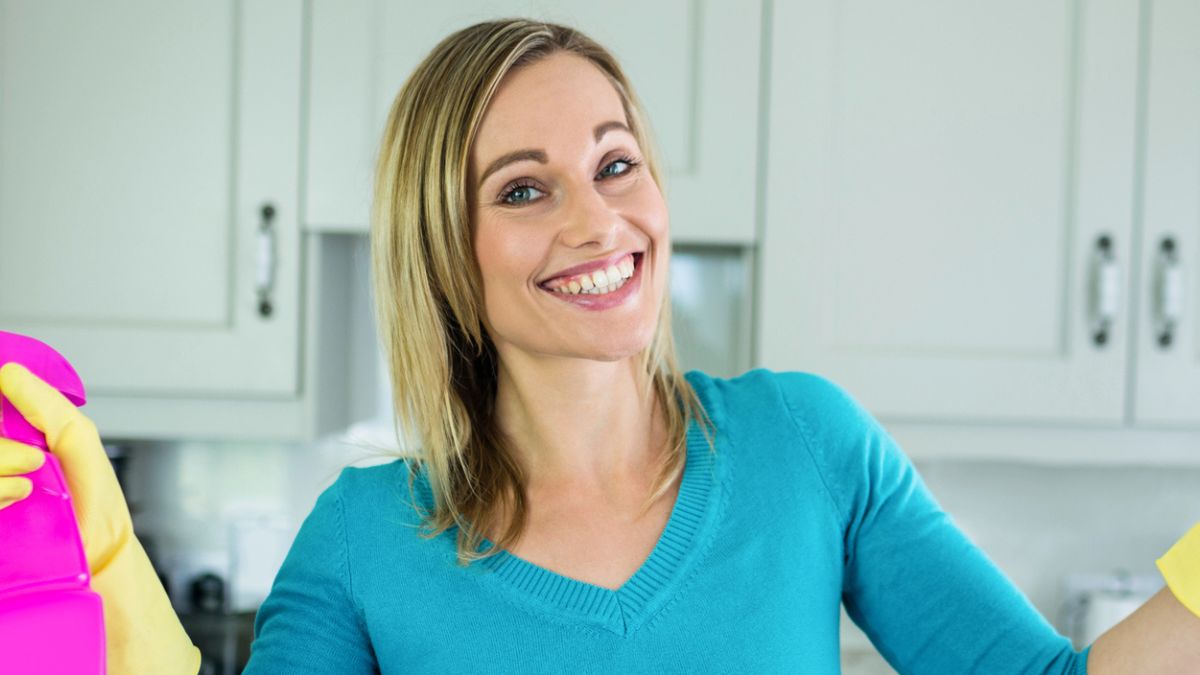 woman cleaning the house