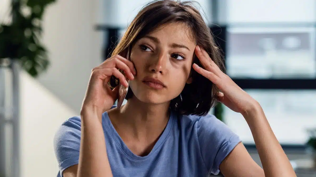 woman crying on the phone