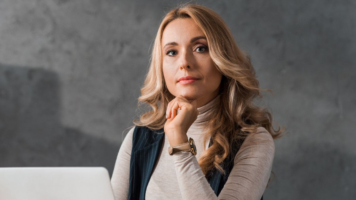 woman employee at desk in office