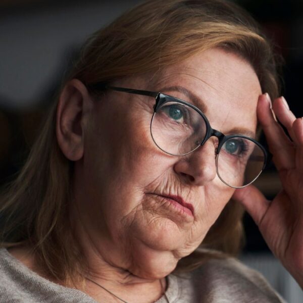 woman frustrated sitting glasses