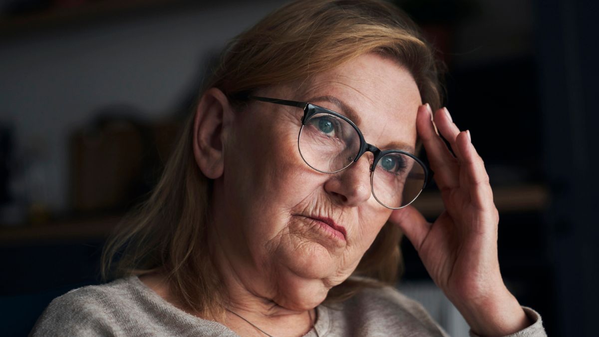 woman frustrated sitting glasses