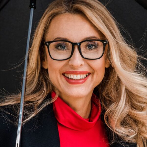 woman glasses umbrella smiling