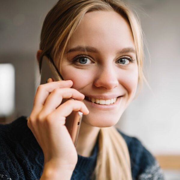 woman holding smile phone