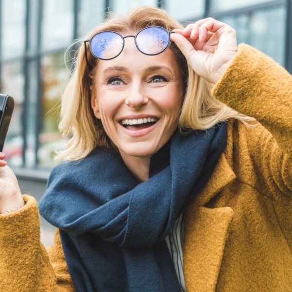 woman holding the camera