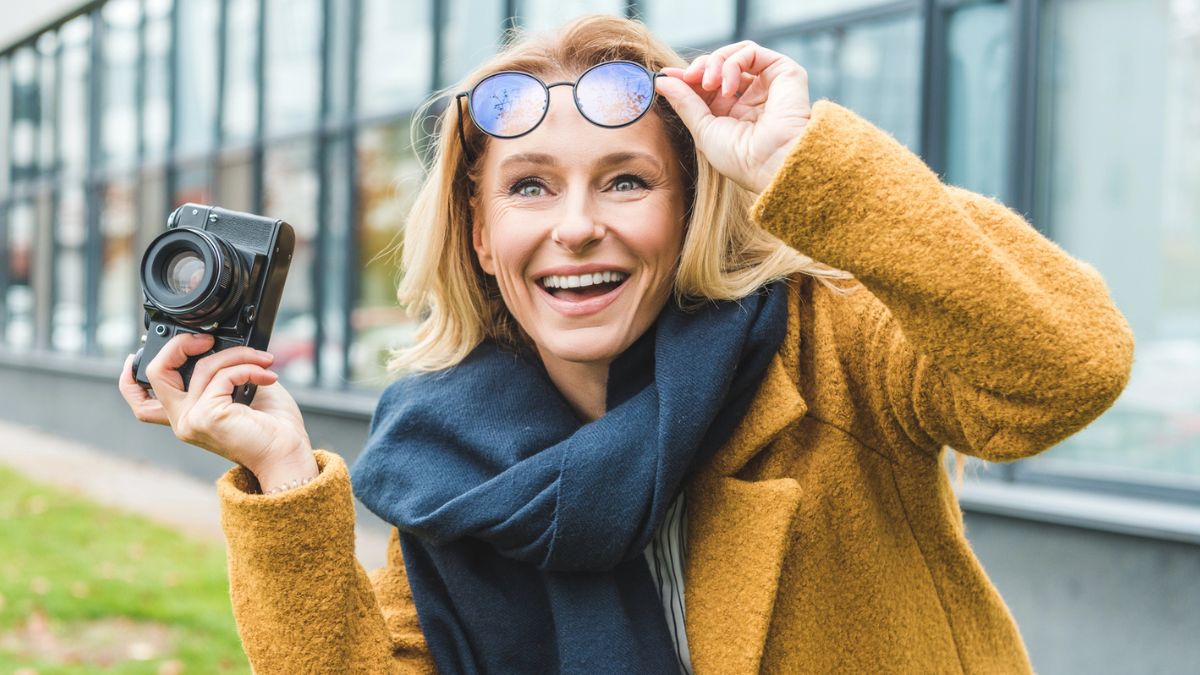 woman holding the camera