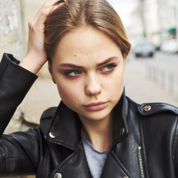 woman in leather jacket