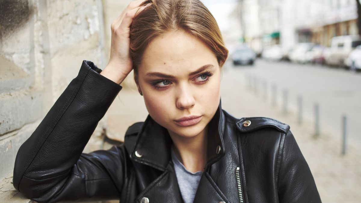 woman in leather jacket