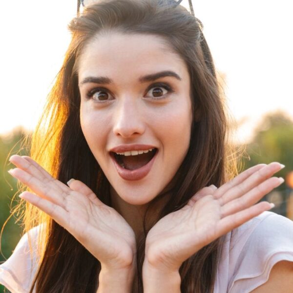 woman laughing hands