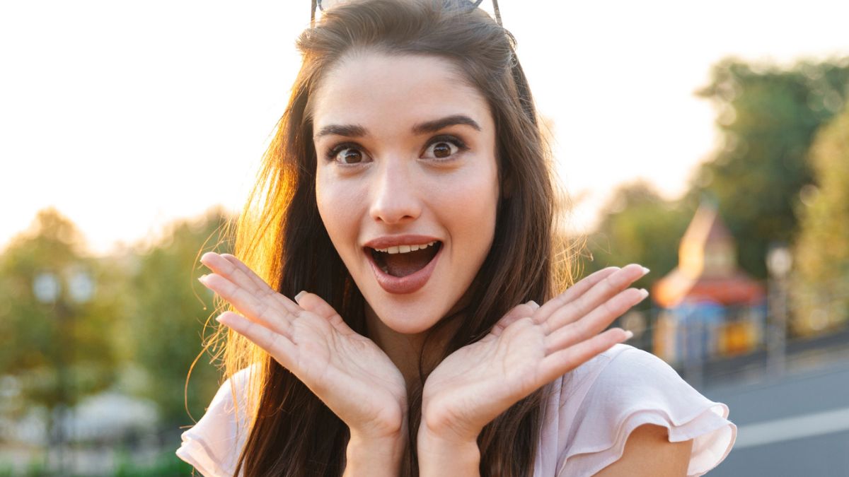 woman laughing hands
