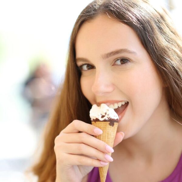 woman licking ice cream