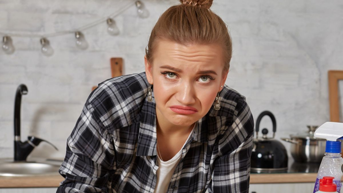 woman not happy cleaning