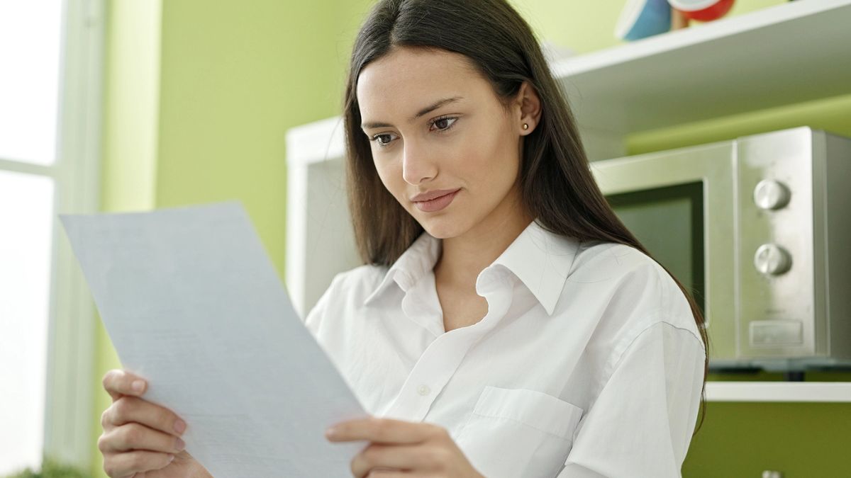 woman reading the mail