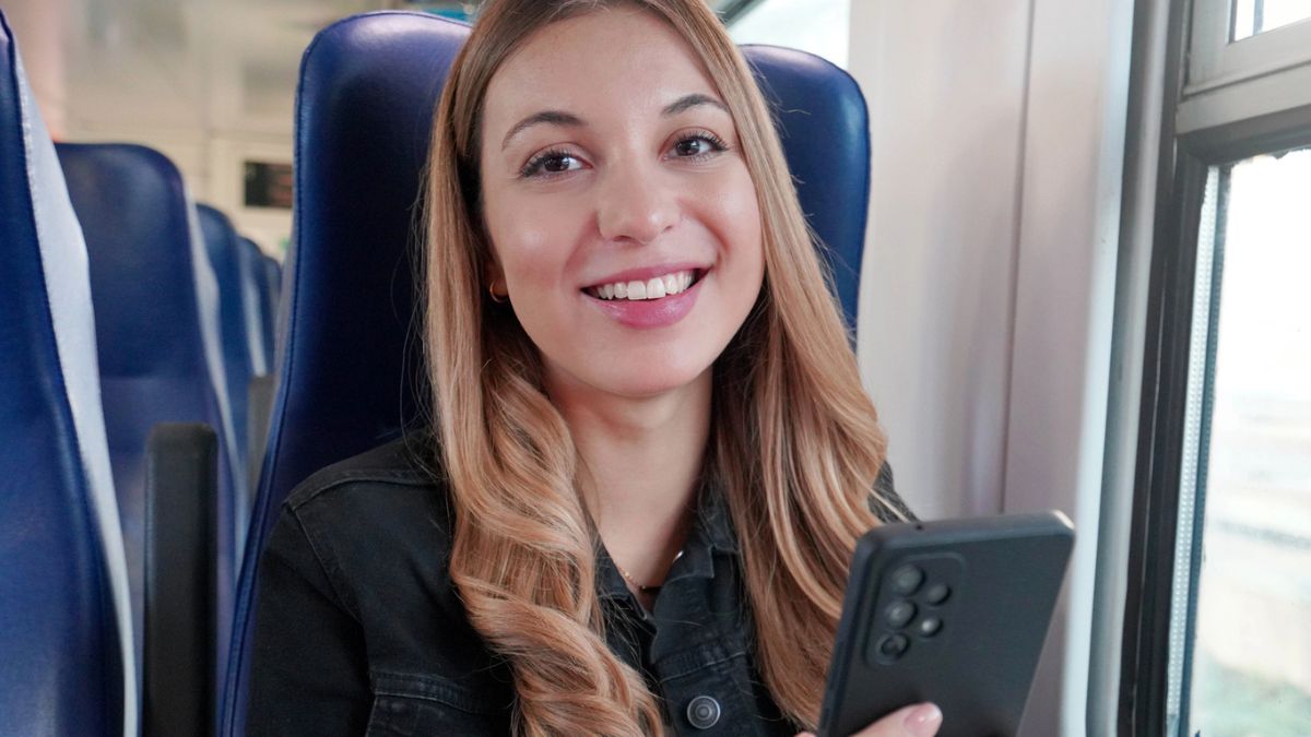 woman riding a train with a generator