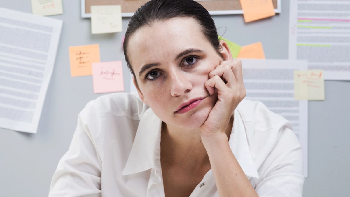 woman sitting at her desk