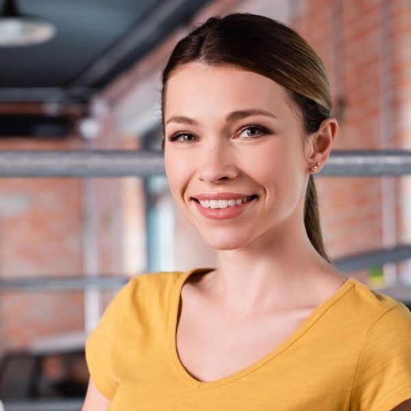 woman smiling her office