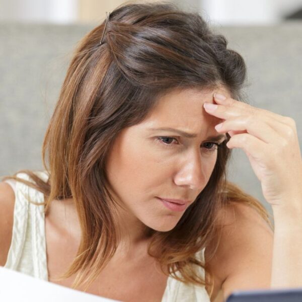 woman staring at her bills (1)