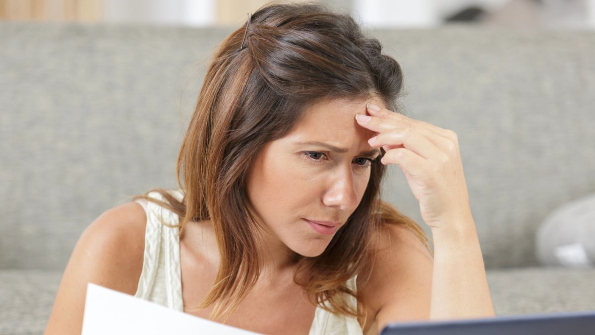 woman staring at her bills (1)